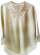 Poncho beige - motif floral Poncho beige - motif floral