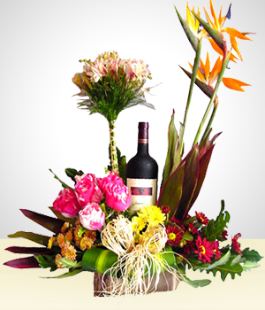 Beautiful Flower Arrangement + Wine Bottle