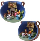 Andean nativity scene inside a ceramic pot
